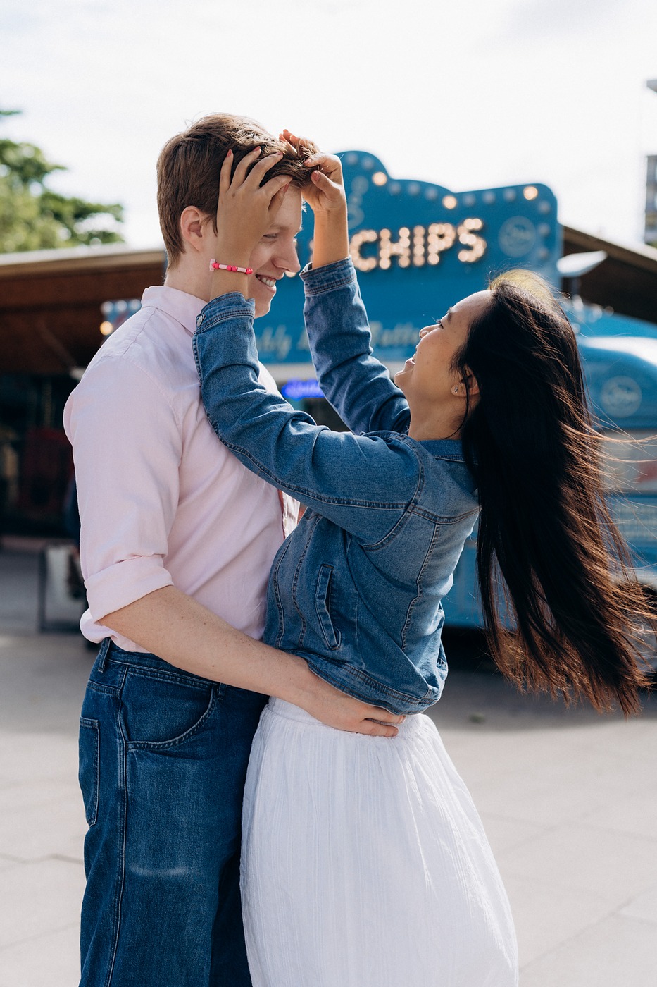 Couple by a blue fish and chips van on the South Bank