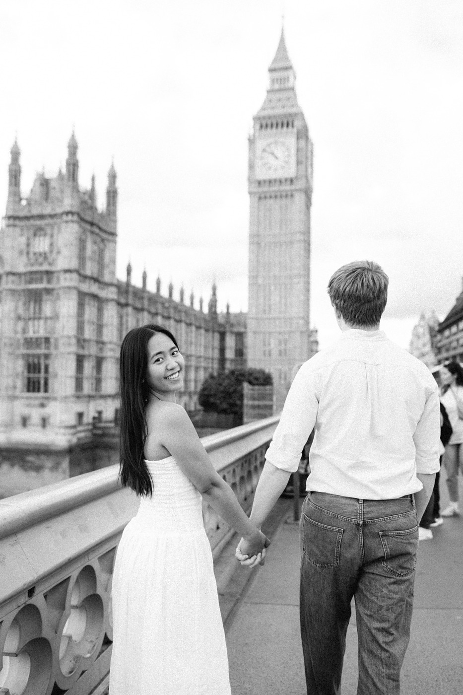 Couple against the yellow wall of the Southbank Centre