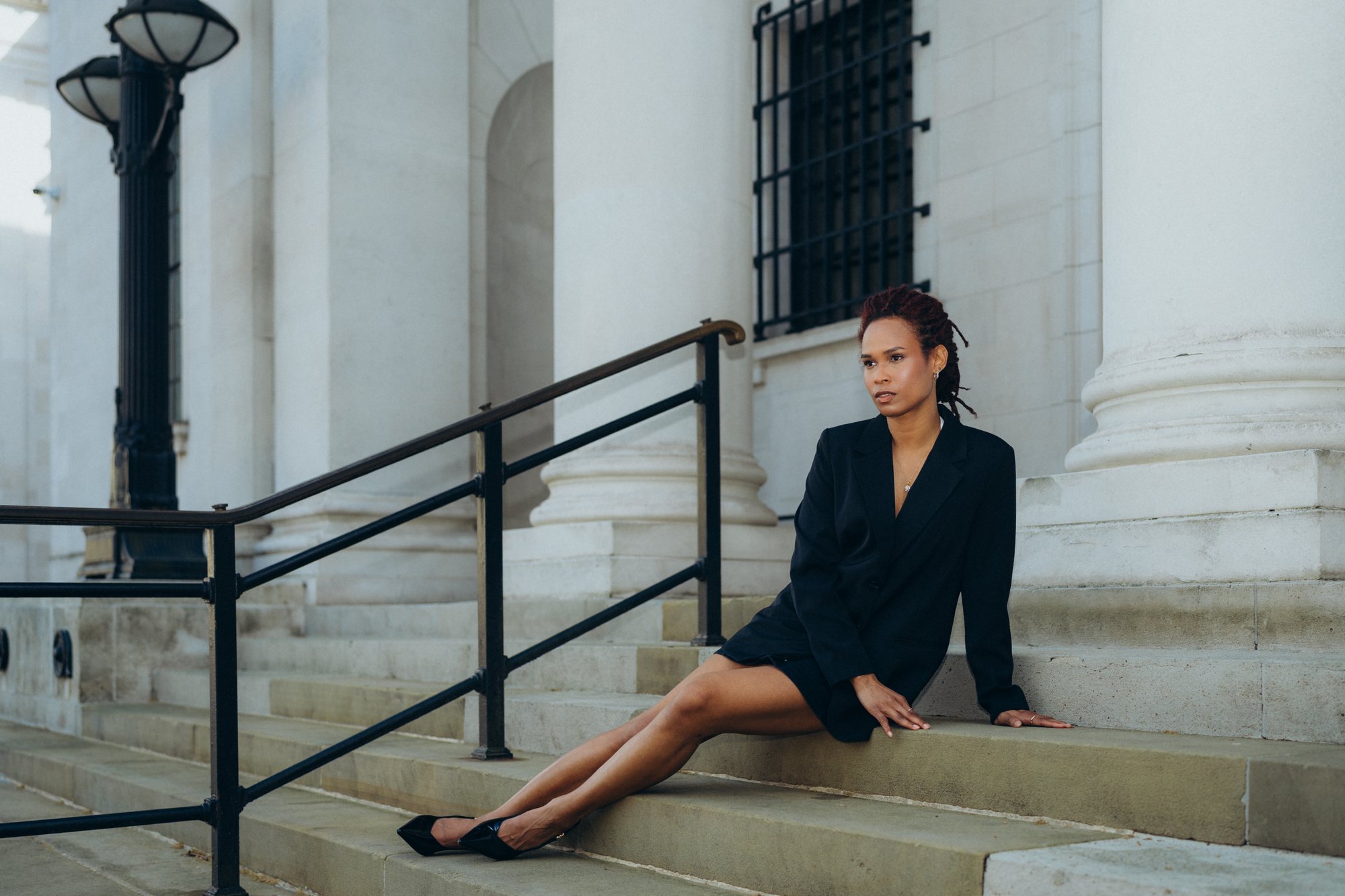 Personal brand photography on the steps of a London building