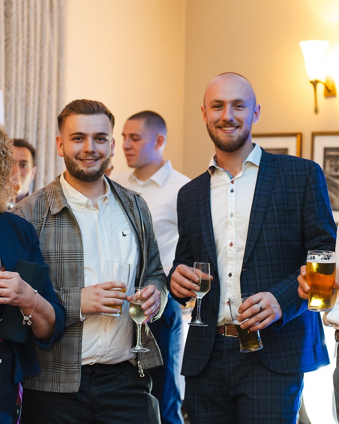 Guests with drinks at a celebration