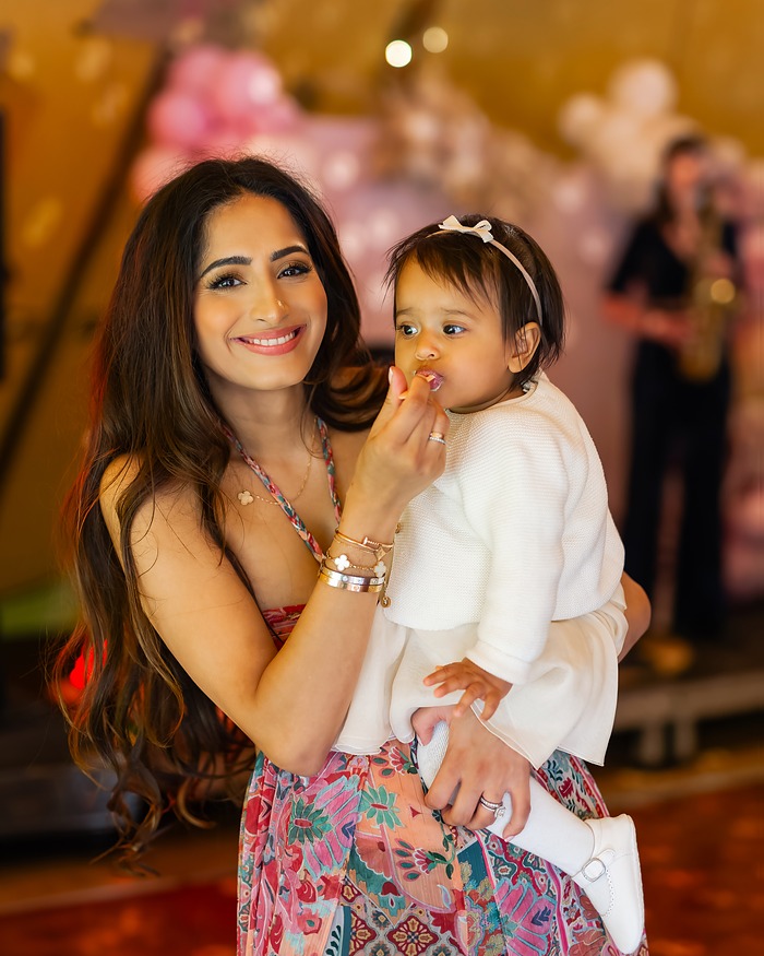 Mother and toddler at a birthday celebration