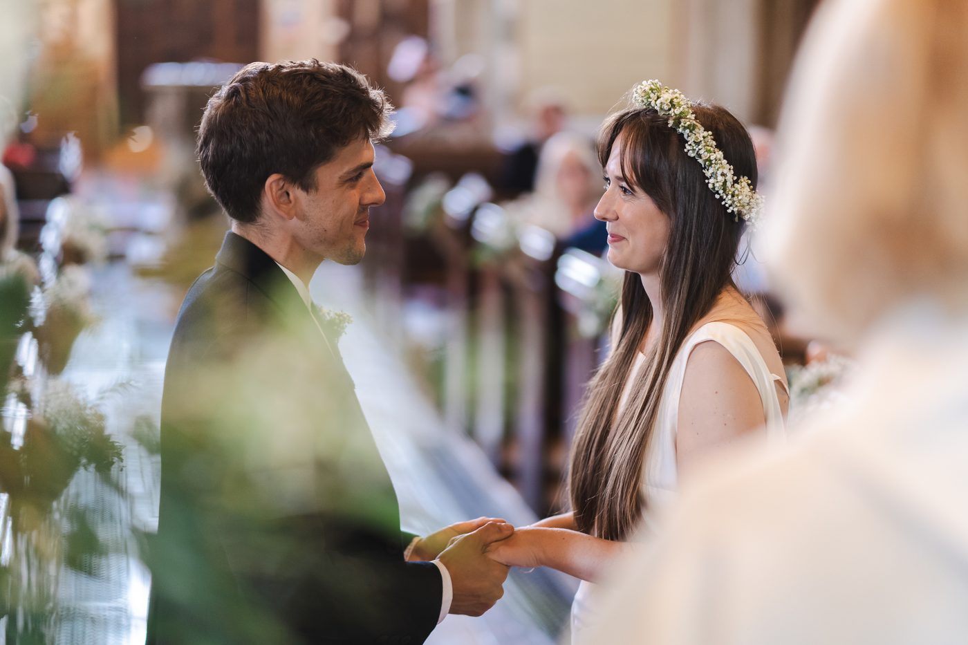 Exchanging vows at St. John the Evangelist Church, Caterham Valley