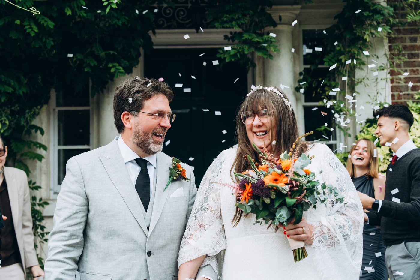 Confetti as a couple leave their wedding in Surrey